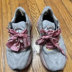 Well Worn Pink Running Shoes